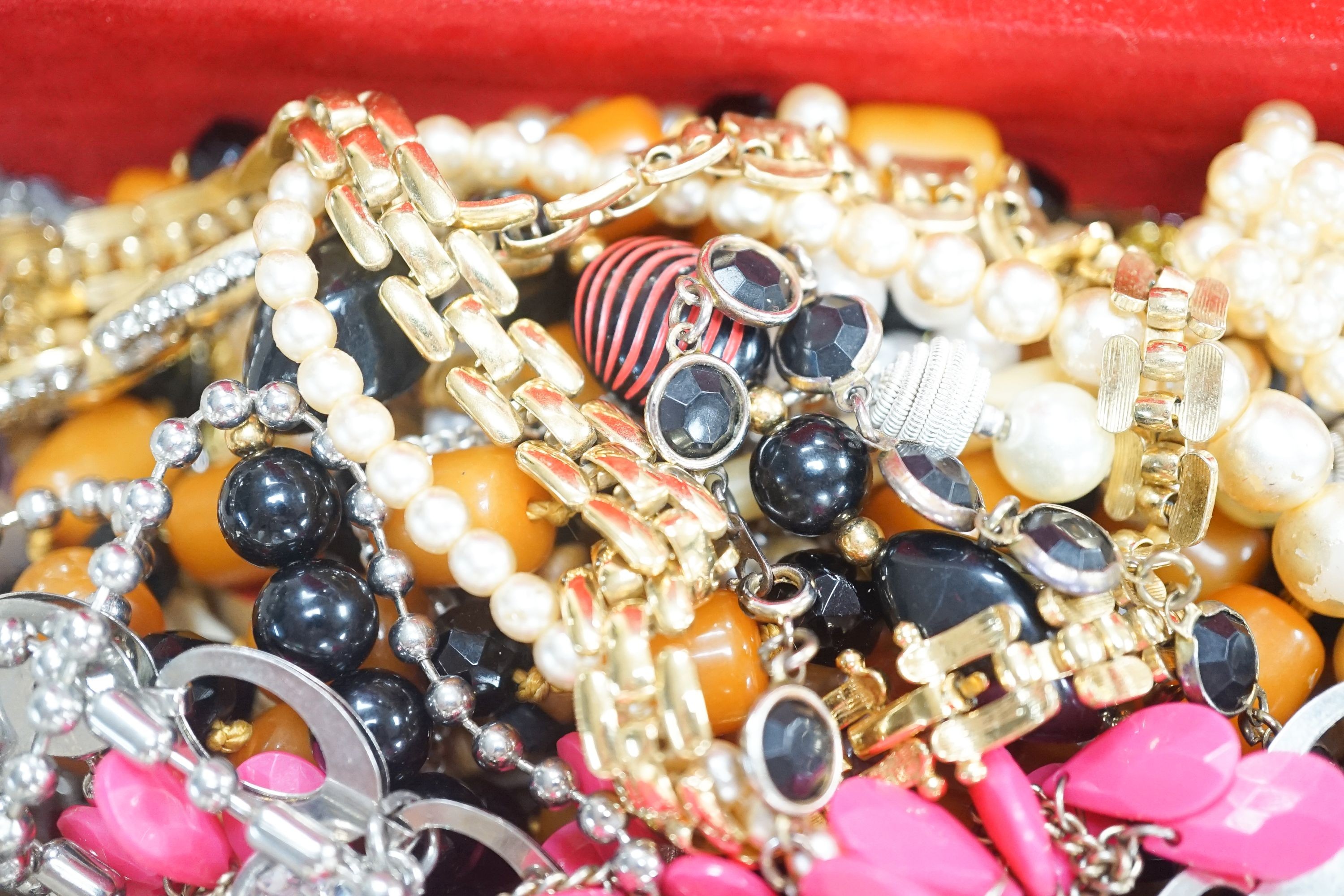 A quantity of mixed costume jewellery, including necklaces, rings etc.